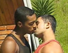 Two cute ebony studs kissing and sucking outdoors